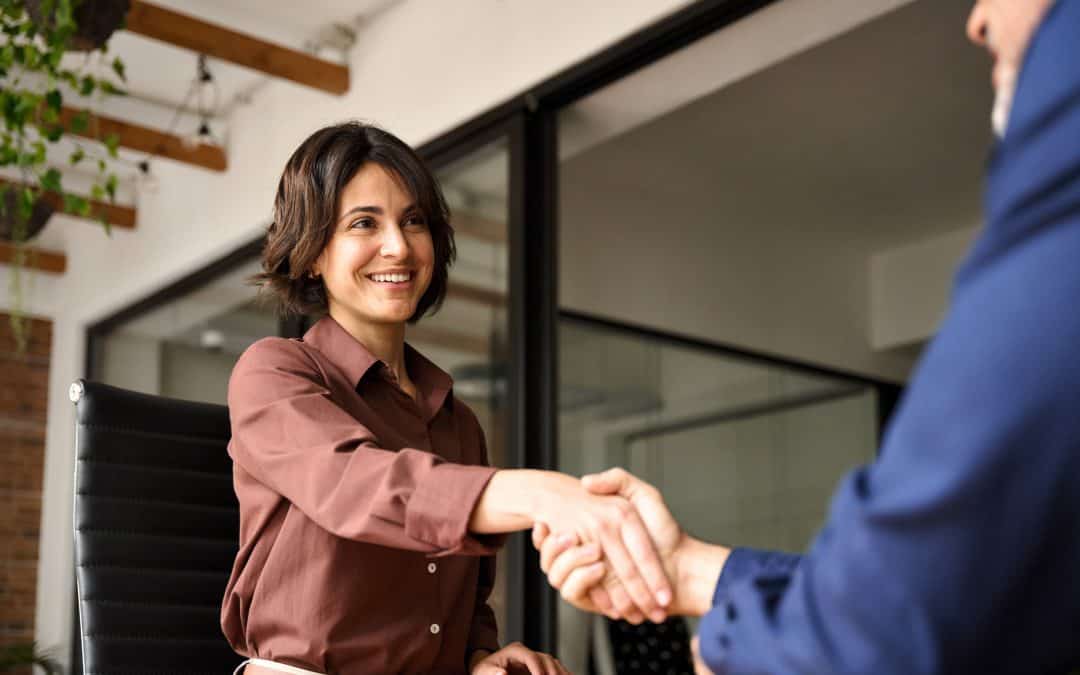 Two members shaking hands